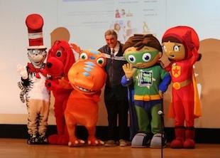 Dr. Shinsky and PBS characters on stage during a PBS activity